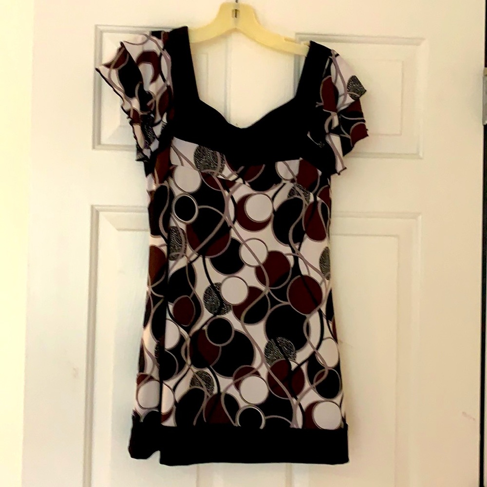 Dressy top with scalloped sleeves